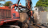 Renforcement de pilier à partir d'une barge